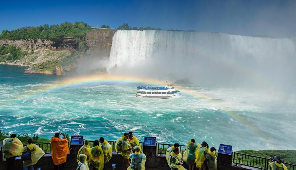 niagara falls, ontario canada, rainbow,  oceam, cruise ship, tourists, yellow raincoats