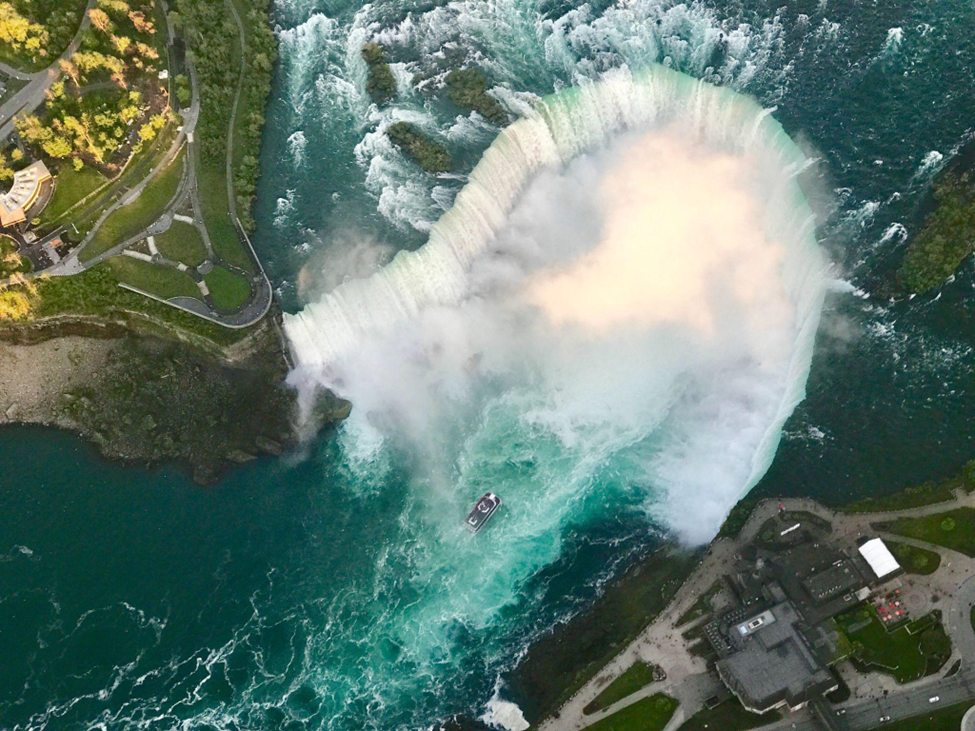Aerial Shot of Niagara Falls, landscape, cruise ship, falls, river, plants, roads, pathways